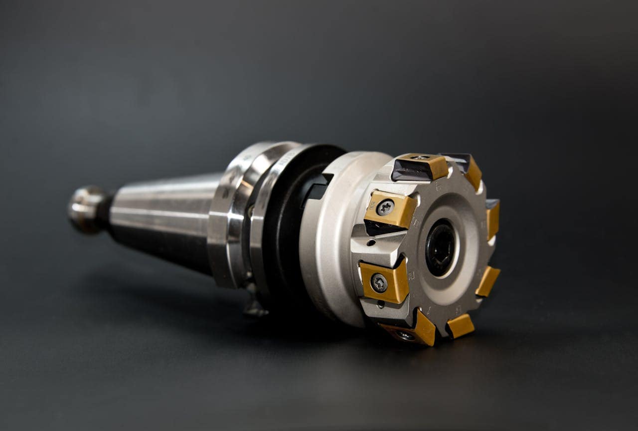 CNC milling cutter machining a precision metal component