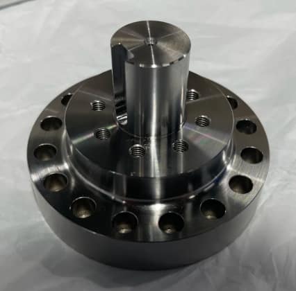 CNC turn-mill stainless steel flange and shaft component